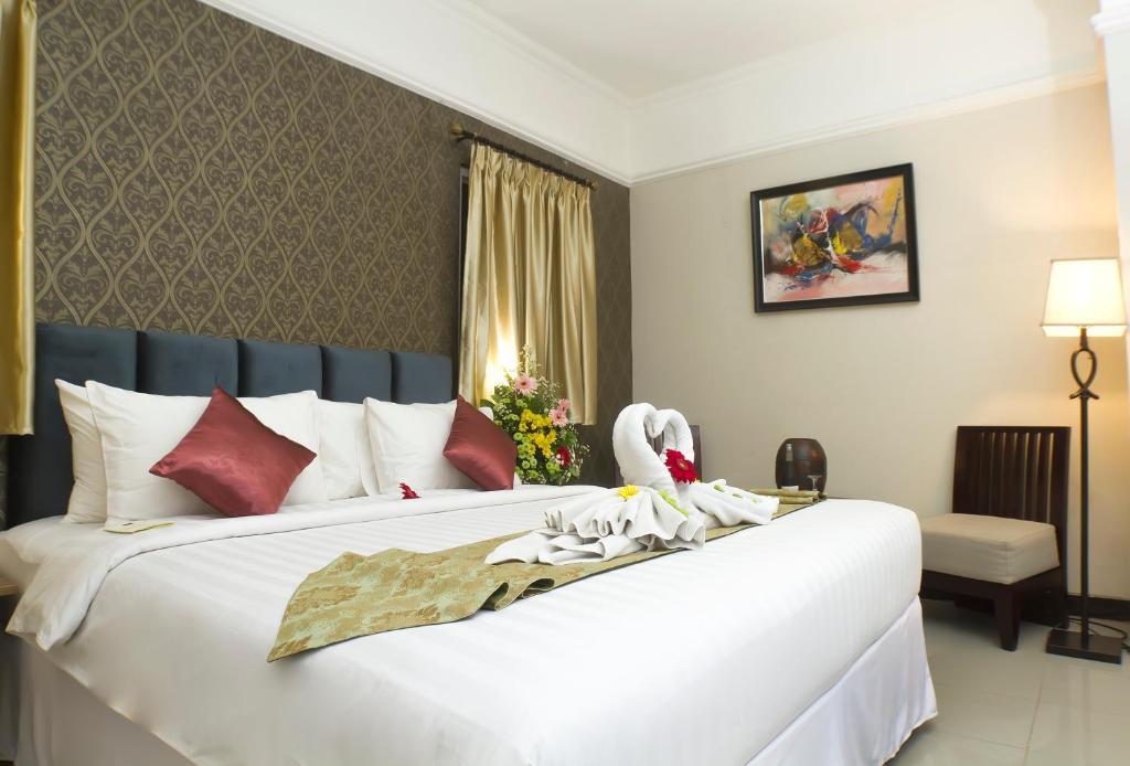 Amarelo Hotel Solo Bilik gambar